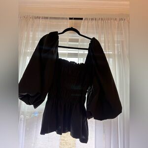 Wide sleeve, smocked black top